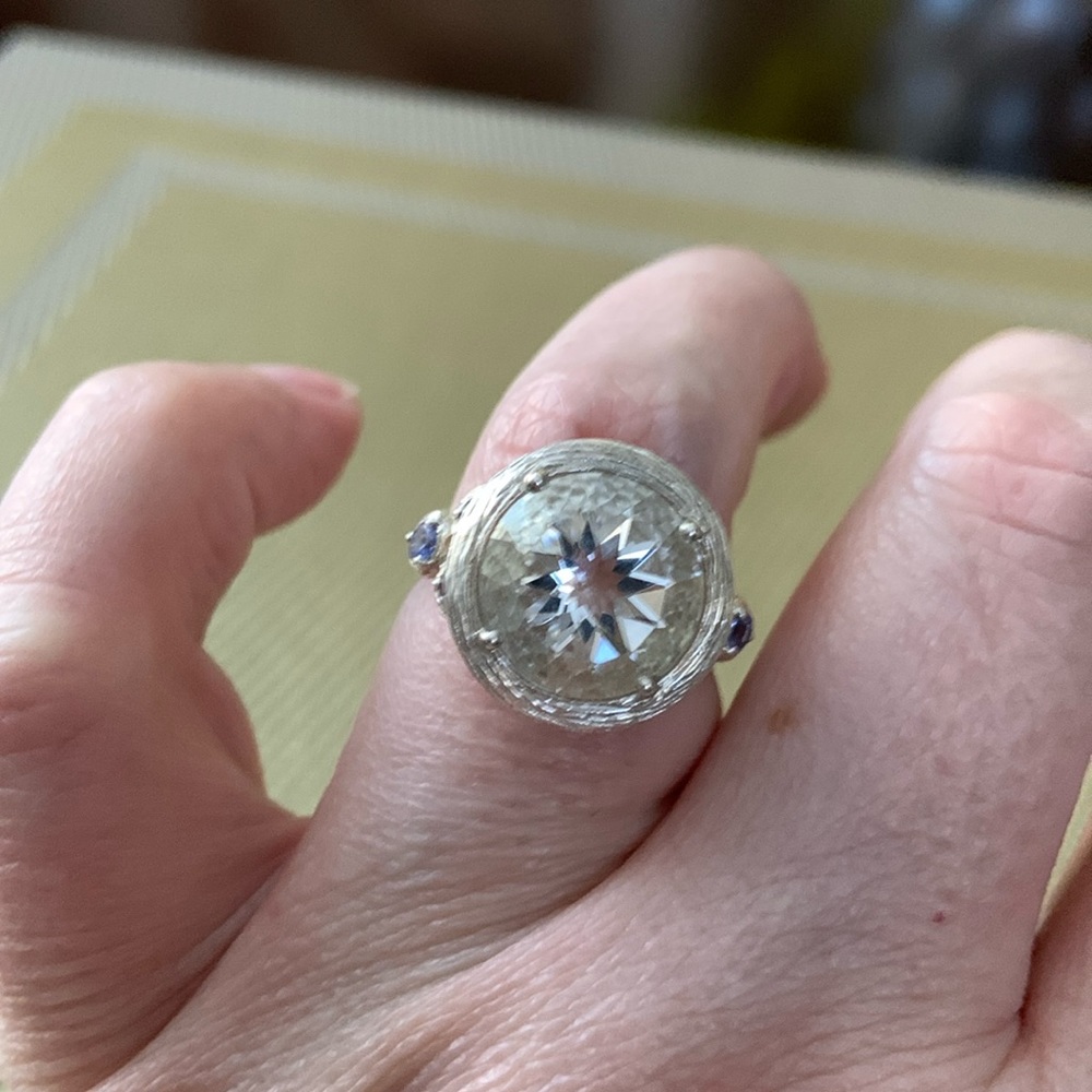 White Topaz ring with small tanzanite accent stones